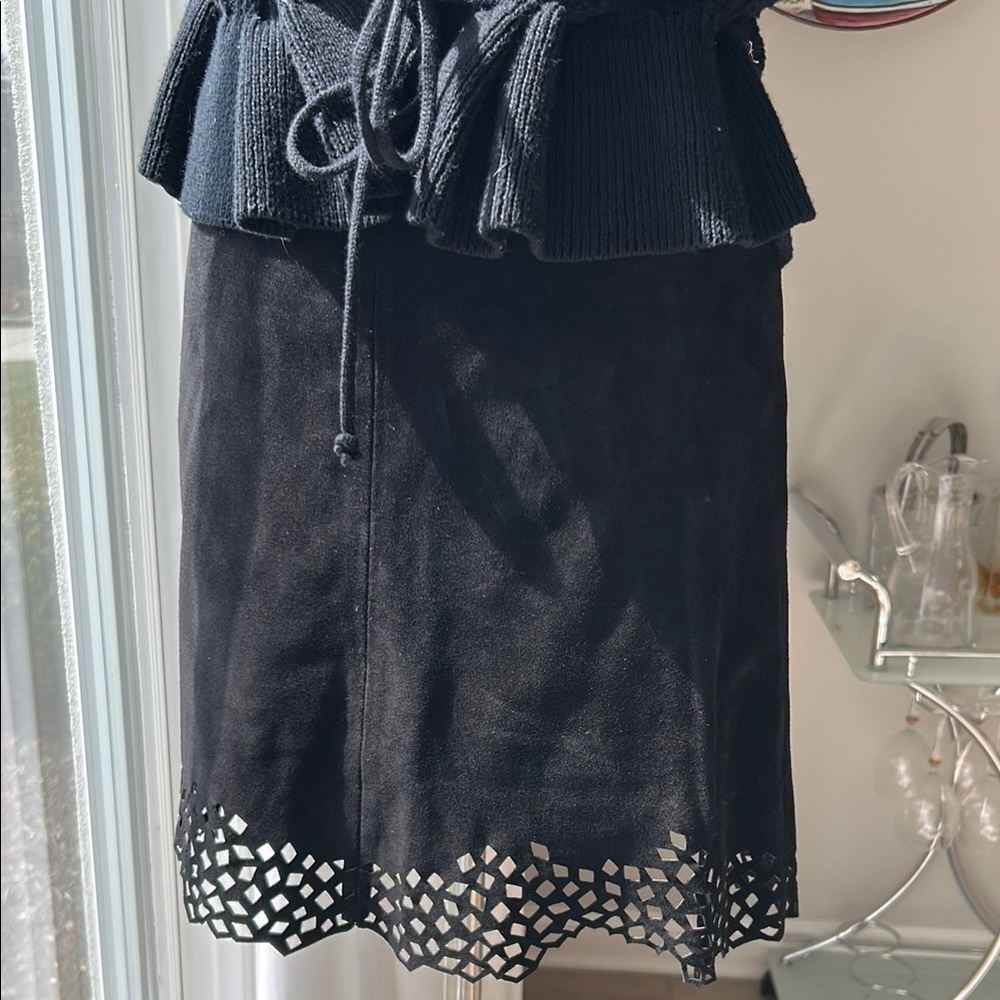 Elegant Black Skirt with Laser-Cut Hem
